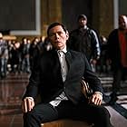 Burn Gorman in The Dark Knight Rises (2012)