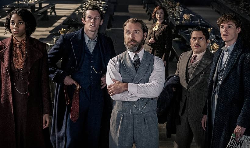 Jude Law, Dan Fogler, Eddie Redmayne, Jessica Williams, and Callum Turner in Fantastic Beasts: The Secrets of Dumbledore (2022)