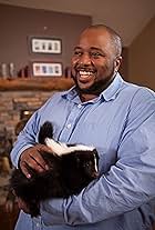 Holding a skunk during a commercial shoot