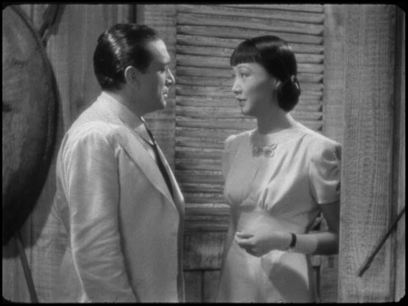 J. Carrol Naish and Anna May Wong in Island of Lost Men (1939)