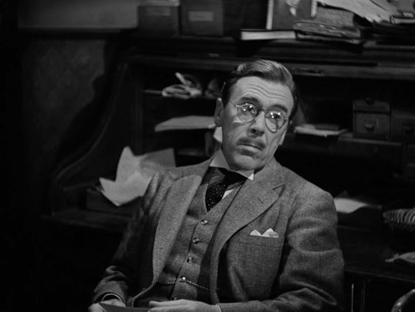 Leo G. Carroll in Rebecca (1940)