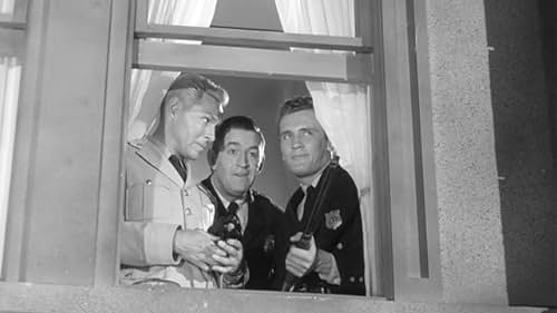 Ted de Corsia, Dean Fredericks, and Roy Thinnes in Steve Canyon (1958)