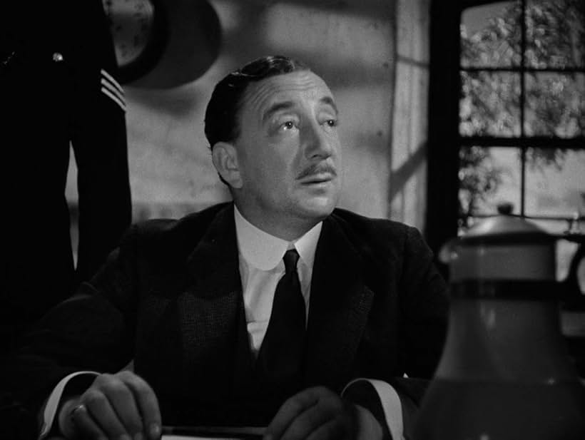 Melville Cooper in Rebecca (1940)