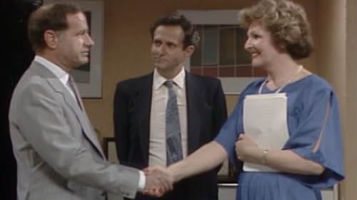 Harry Ditson, Penelope Keith, and Geoffrey Palmer in Executive Stress (1986)