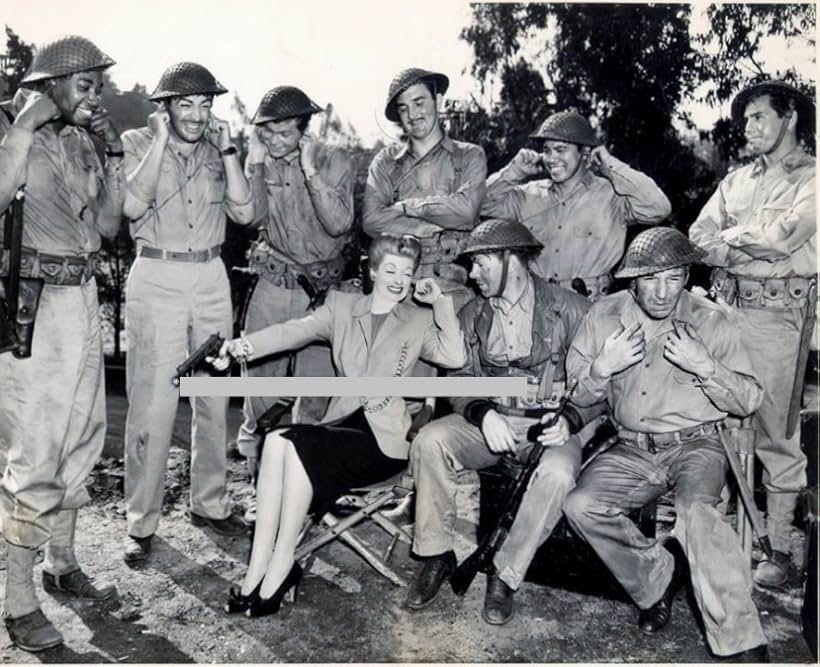 Desi Arnaz, Lucille Ball, Robert Taylor, Lee Bowman, Roque Espiritu, George Murphy, Barry Nelson, Lloyd Nolan, Kenneth Spencer, and Phillip Terry in Bataan (1943)