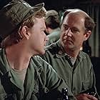 David Ogden Stiers and Bill Snider in M*A*S*H (1972)