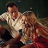 Chris Klein and Katrina Bowden in American Reunion (2012)