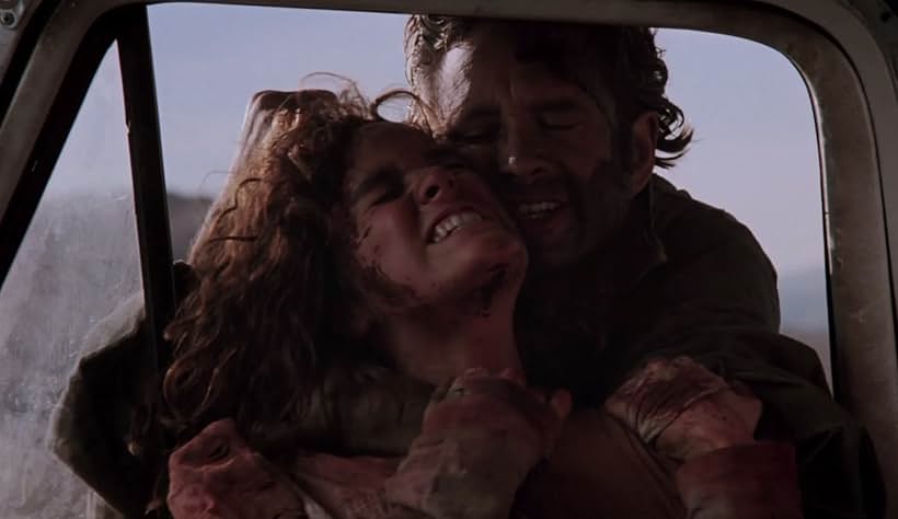 Tom Everett and Kate Hodge in Leatherface: Texas Chainsaw Massacre III (1990)