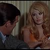 Charo and Christopher George in Tiger by the Tail (1970)