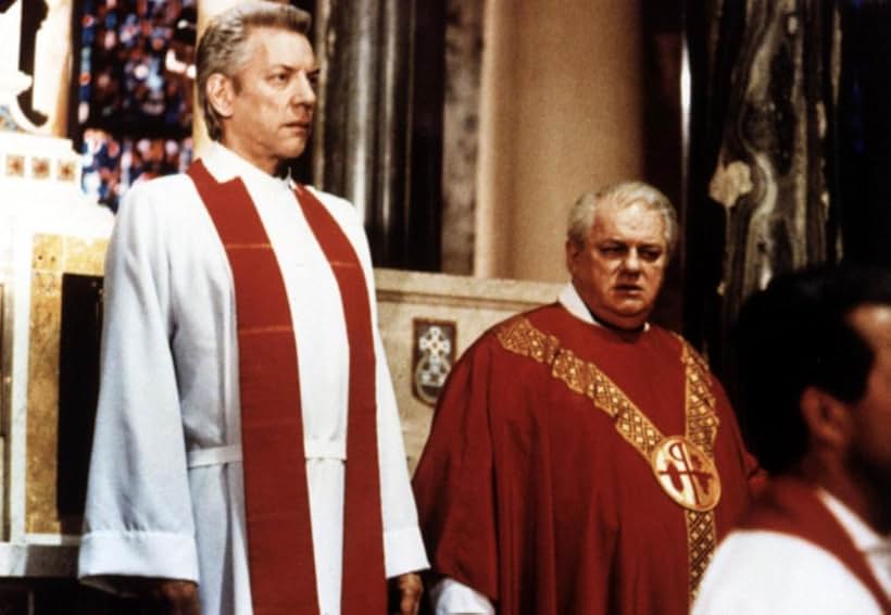 Donald Sutherland and Charles Durning in The Rosary Murders (1987)