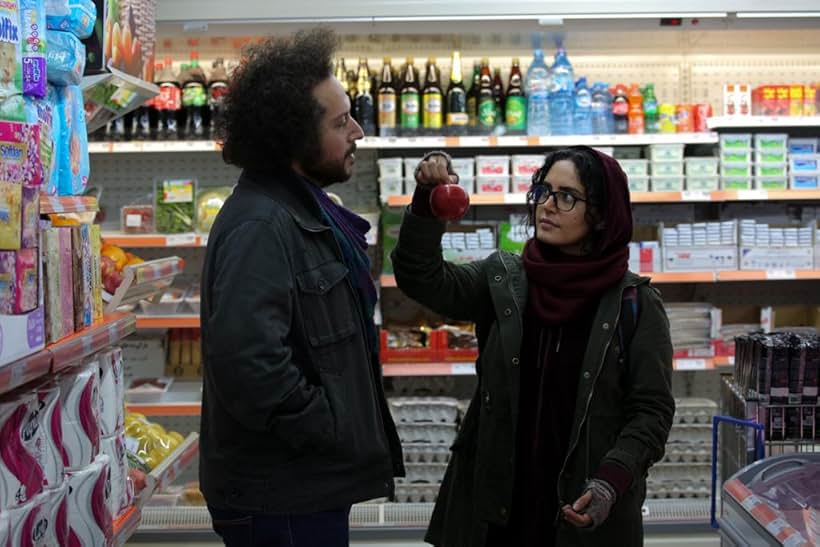 Sina Hejazi and Elnaz Shakerdoost in All Through the Night (2020)