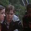 Jonathan Brandis, Emily Perkins, and Marlon Taylor in It (1990)