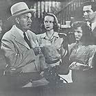 Benson Fong, Teala Loring, George Holmes, Janet Shaw, and Sidney Toler in Dark Alibi (1946)