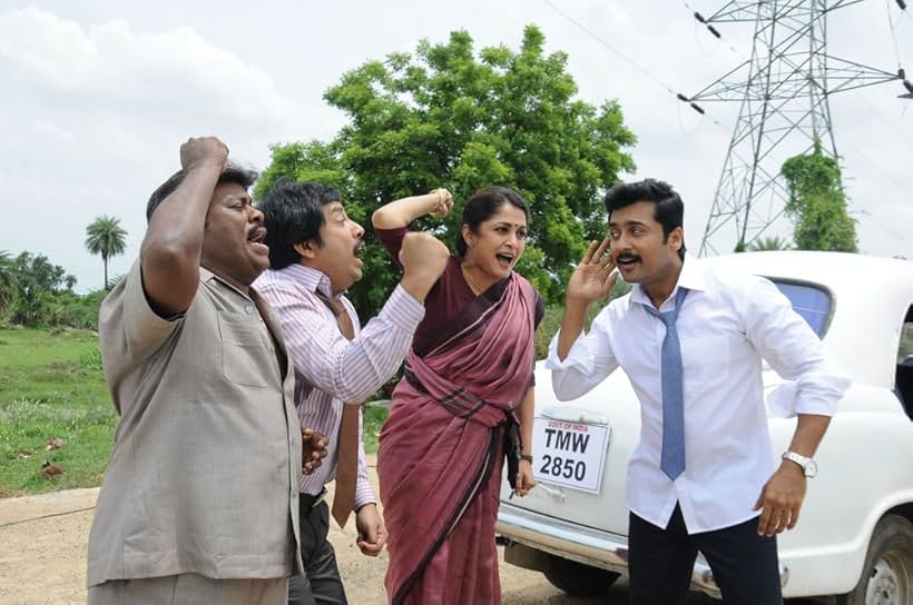 Ramya Krishnan, Senthil, Suriya, and Sathyan in Thaanaa Serndha Koottam (2018)