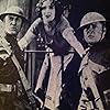 Dolores Del Río, Edmund Lowe, and Victor McLaglen in What Price Glory (1926)