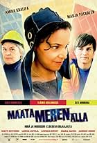 Maata meren alla (2009)