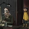 Dakota Fanning and John Hodgman in Coraline (2009)