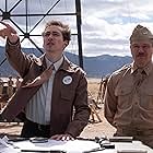 Matt Damon and Dylan Arnold in Oppenheimer (2023)