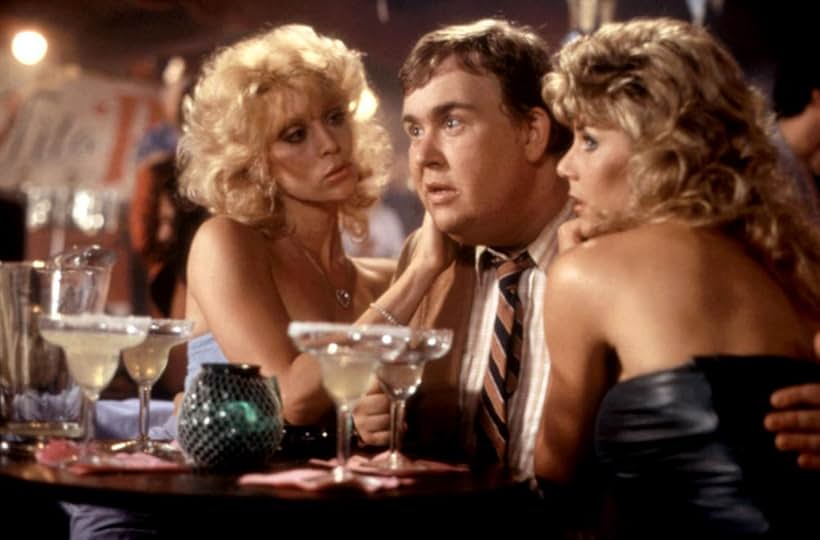 John Candy, Judy Landers, and K.C. Winkler in Armed and Dangerous (1986)