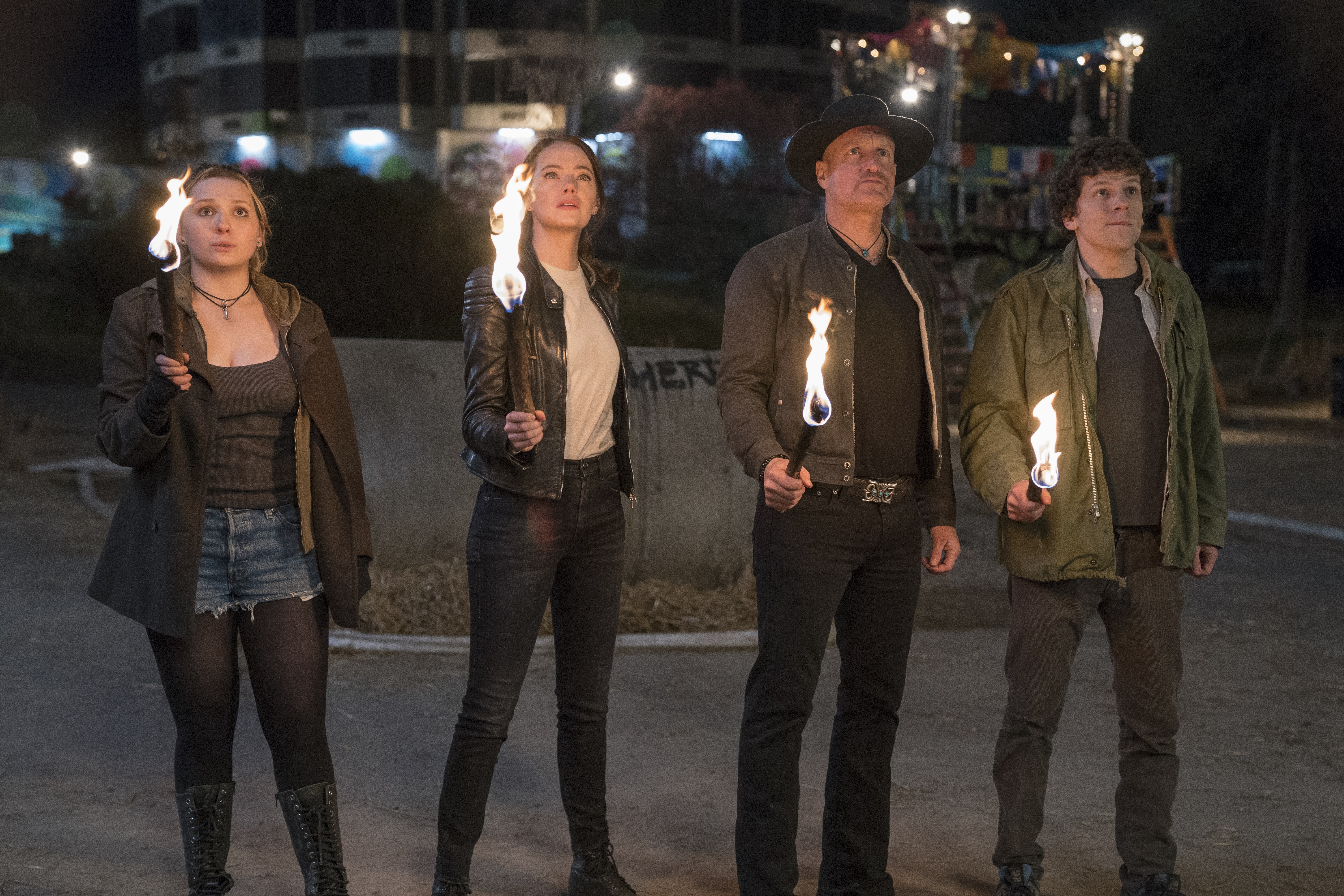 Woody Harrelson, Jesse Eisenberg, Abigail Breslin, and Emma Stone in Zombieland: Double Tap (2019)