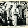 James Mason, Harry Bartell, Dorothy Dandridge, and John Gallaudet in The Decks Ran Red (1958)