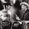 Myron Healey and Gilbert Roland in Apache War Smoke (1952)