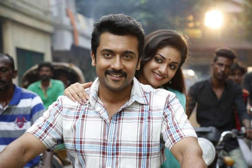 Suriya and Keerthy Suresh in Thaanaa Serndha Koottam (2018)