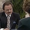 Peter Bowles and Penelope Keith in Executive Stress (1986)