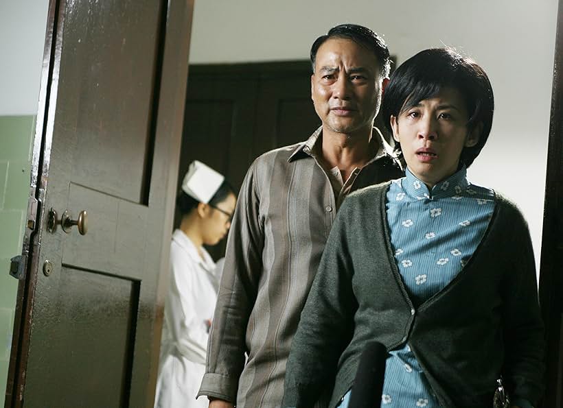 Sandra Kwan Yue Ng and Simon Yam in Echoes of the Rainbow (2010)