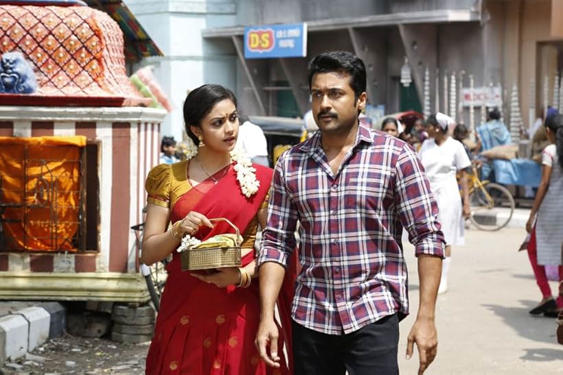 Suriya and Keerthy Suresh in Thaanaa Serndha Koottam (2018)