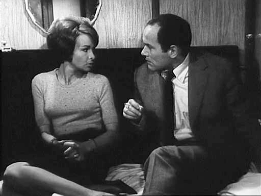 Françoise Arnoul and Marcel Bozzuffi in Le train bleu s'arrête 13 fois (1965)