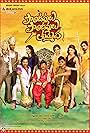 Mohan Babu, Raveena Tandon, Hansika Motwani, Vishnu Manchu, Manoj Kumar Manchu, Varun Sandesh, Tanish, Vennela Kishore, and Pranitha Subhash in Pandavulu Pandavulu Thummeda (2014)