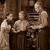 Judy Garland, Clara Blandick, and Charley Grapewin in The Wizard of Oz (1939)