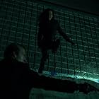 Simon Northwood and Maggie Q in Nikita (2010)