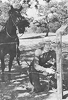 Jim Bannon in The Fighting Redhead (1949)