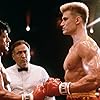 Dolph Lundgren, Sylvester Stallone, Marty Denkin, and George Rogan in Rocky IV (1985)