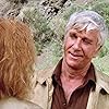 Leslie Nielsen and Julie Sommars in Cave In! (1983)