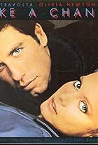 Olivia Newton-John & John Travolta: Take a Chance (1983)