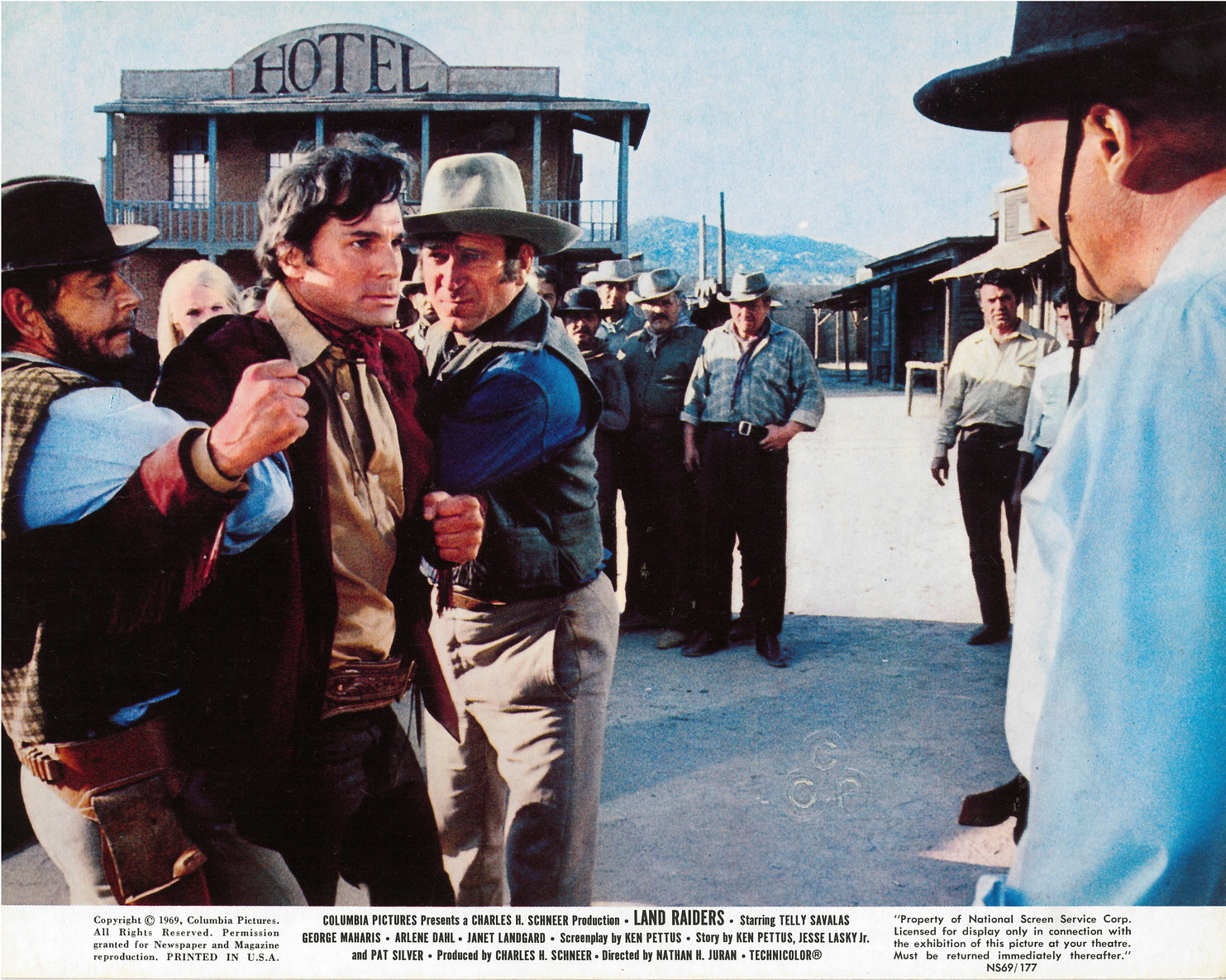 Telly Savalas and George Maharis in Land Raiders (1969)