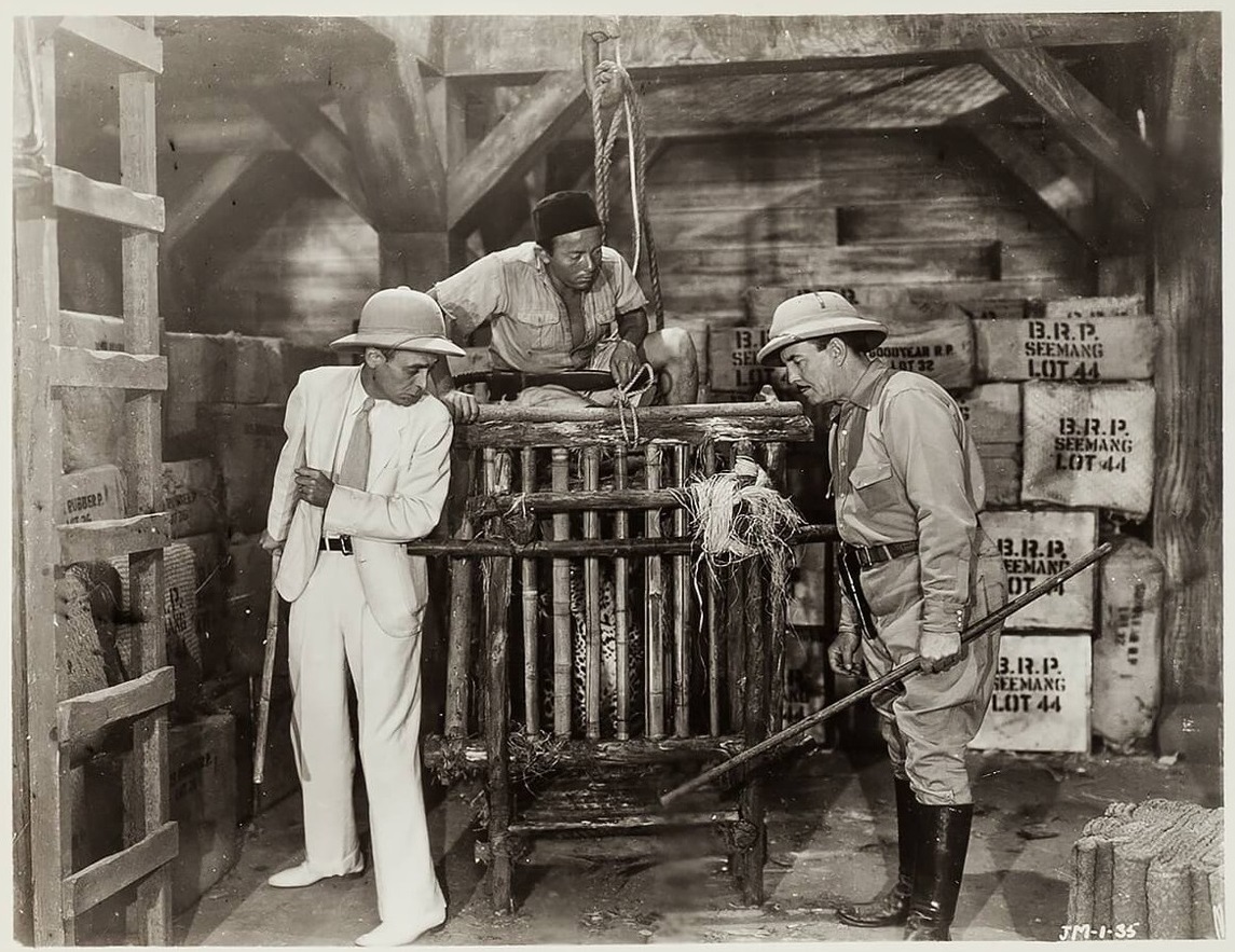 Frank Buck and Willie Fung in Jungle Menace (1937)