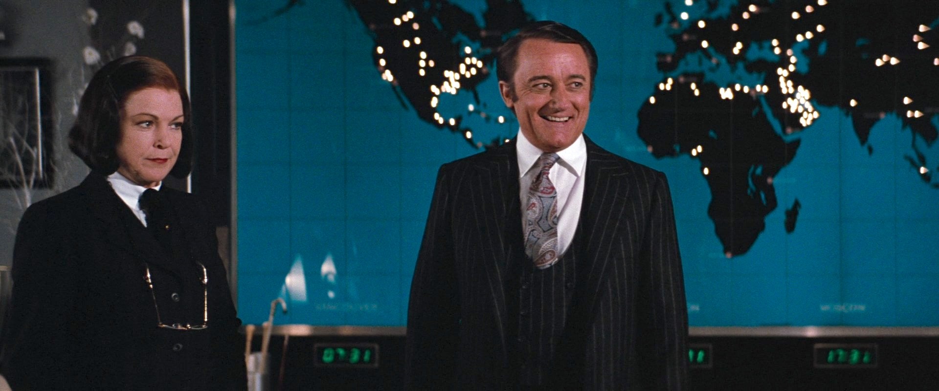 Robert Vaughn and Annie Ross in Superman III (1983)