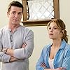 Yannick Bisson and Candace Cameron Bure in The Julius House: An Aurora Teagarden Mystery (2016)