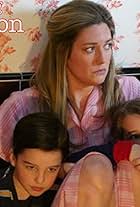 Zoe Perry, Raegan Revord, and Iain Armitage in Young Sheldon (2017)