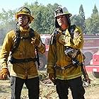 Billy Burke and Jordan Calloway in Fire Country (2022)