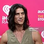 Justin Johnson Cortez presents at iHeart Radio Festival 2022