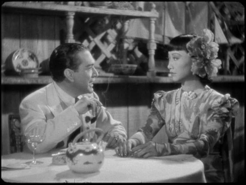 J. Carrol Naish and Anna May Wong in Island of Lost Men (1939)