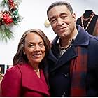 Liza Huget and Harry Lennix in A Christmas Together with You (2021)