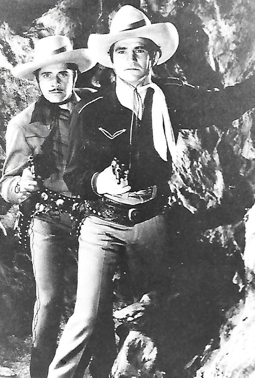 Sammy Baugh and Duncan Renaldo in King of the Texas Rangers (1941)