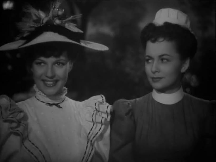 Olivia de Havilland and Rita Hayworth in The Strawberry Blonde (1941)