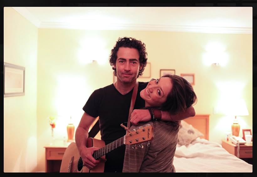 John Fortson as Rockstar Ryan Mercer with Zarah Mahler in the 2012 film Motel Blues